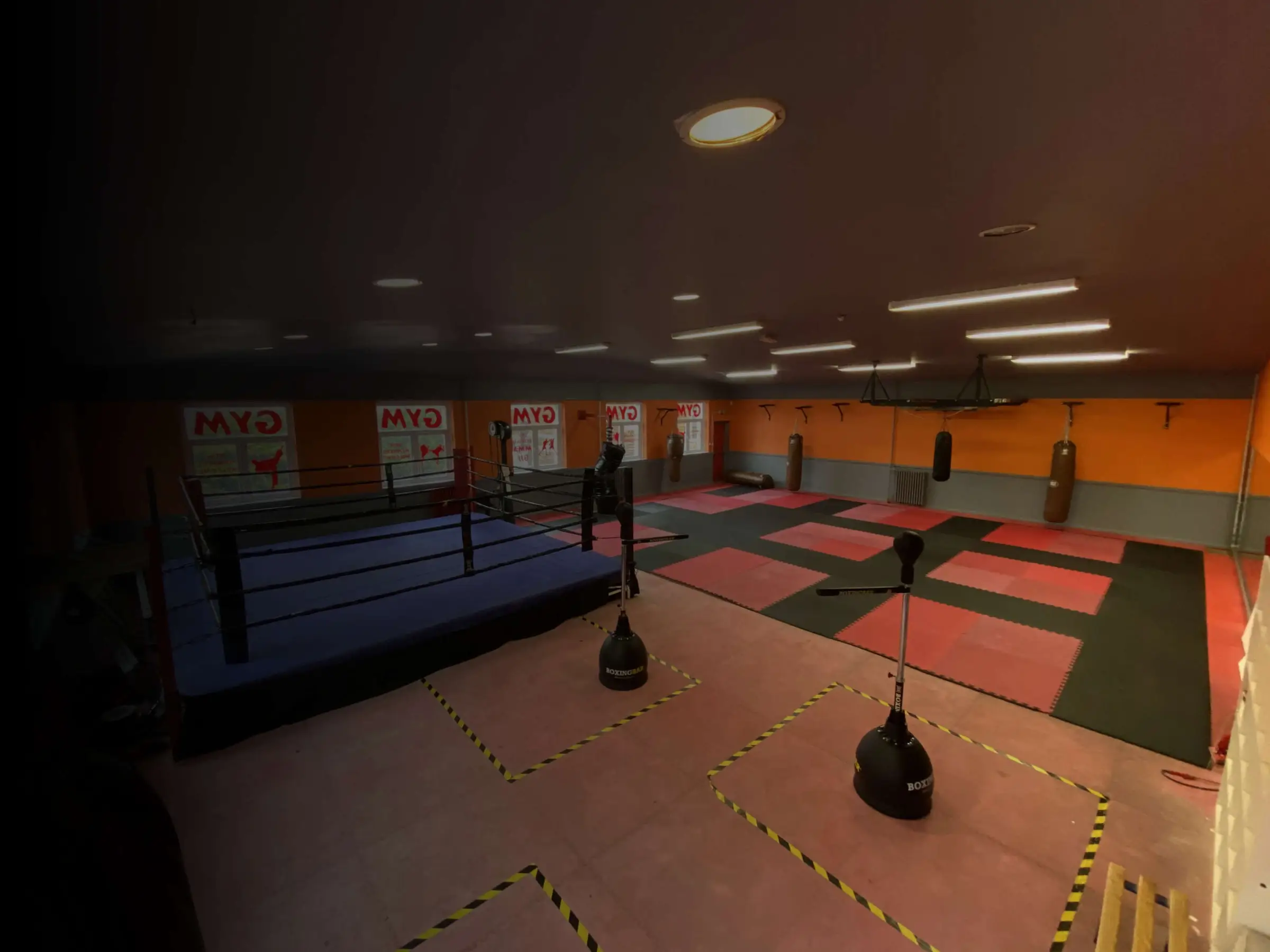 The 16ft boxing ring and matted area in The Bar Gym fight school, Worthing