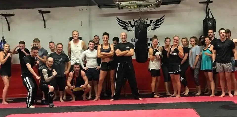 Fight school class group photo on the mats at The Bar Gym Worthing