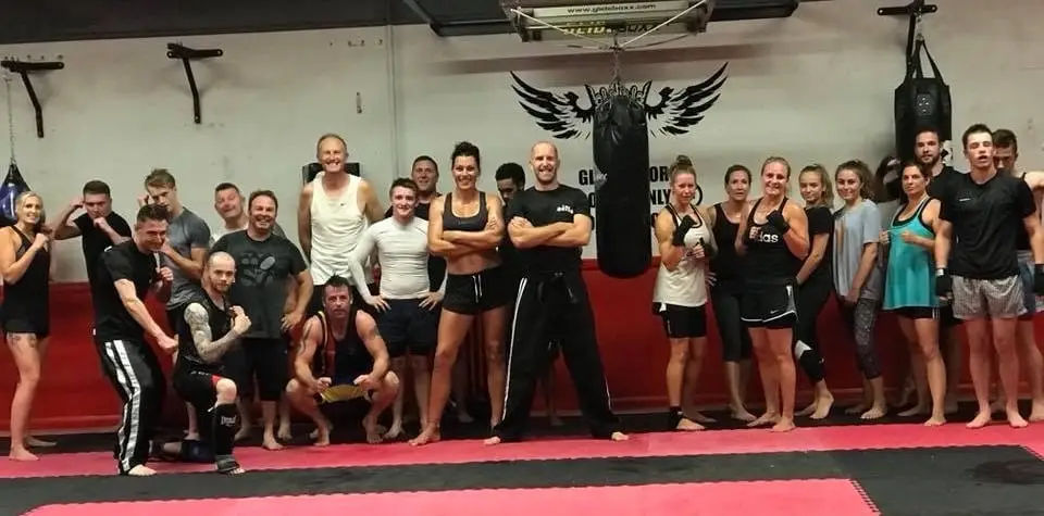 Fight school class group photo on the mats, The Bar Gym Worthing