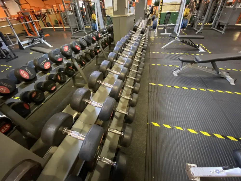 Long rack of dumbbells in the free weights area, The Bar Gym Worthing
