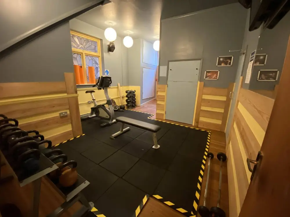 Side room with a bench and floor mats, The Bar Gym Worthing