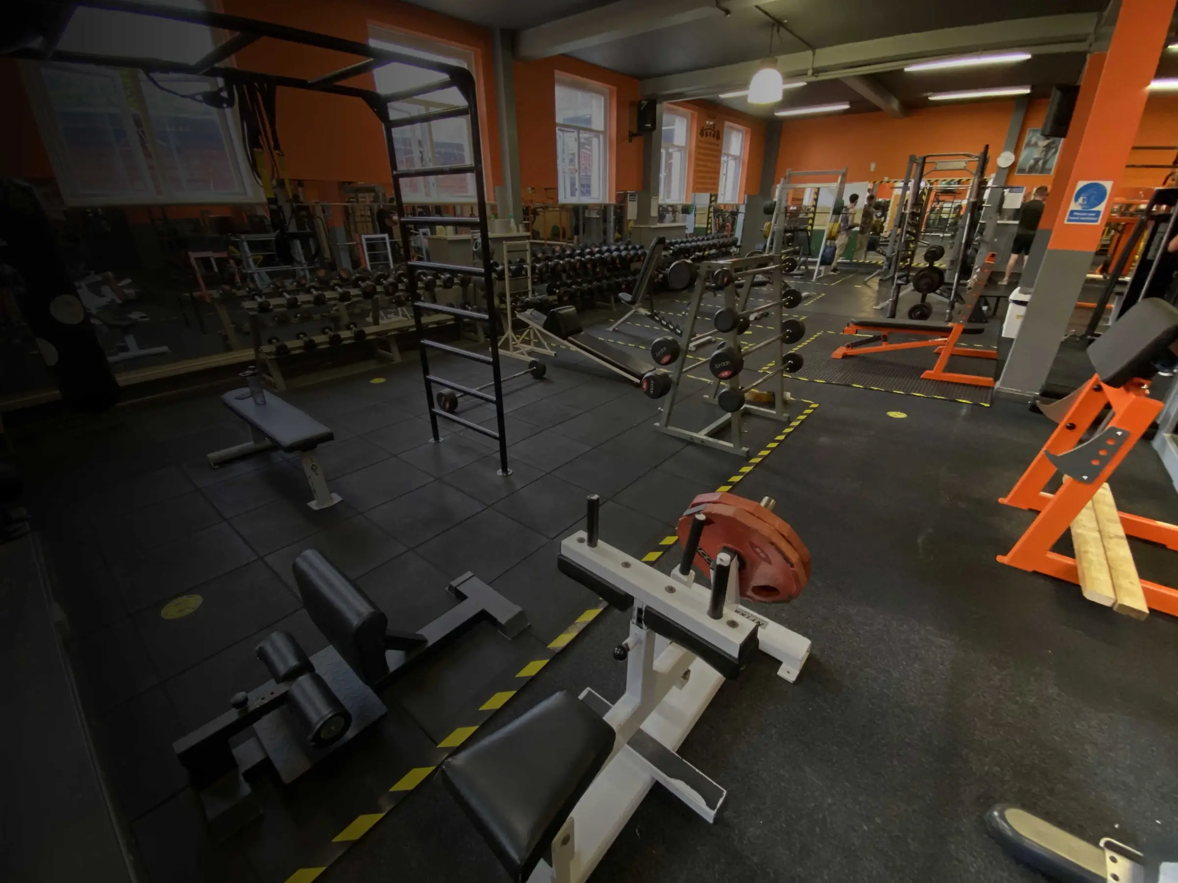 The gym floor with racks and machines at The Bar Gym Worthing